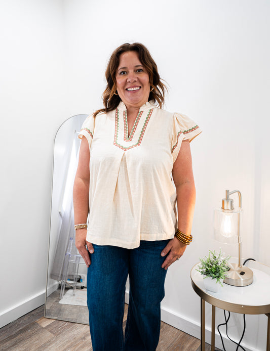 Linen ruffle sleeve top with colorful details