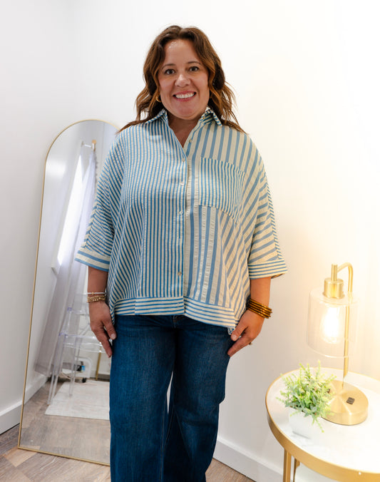 Oversized button down collared shirt with stripes.