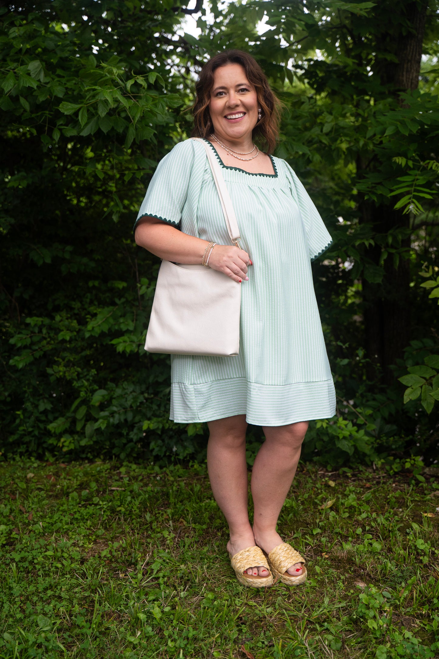 short modest dress with vertical stripes and stitched outline 