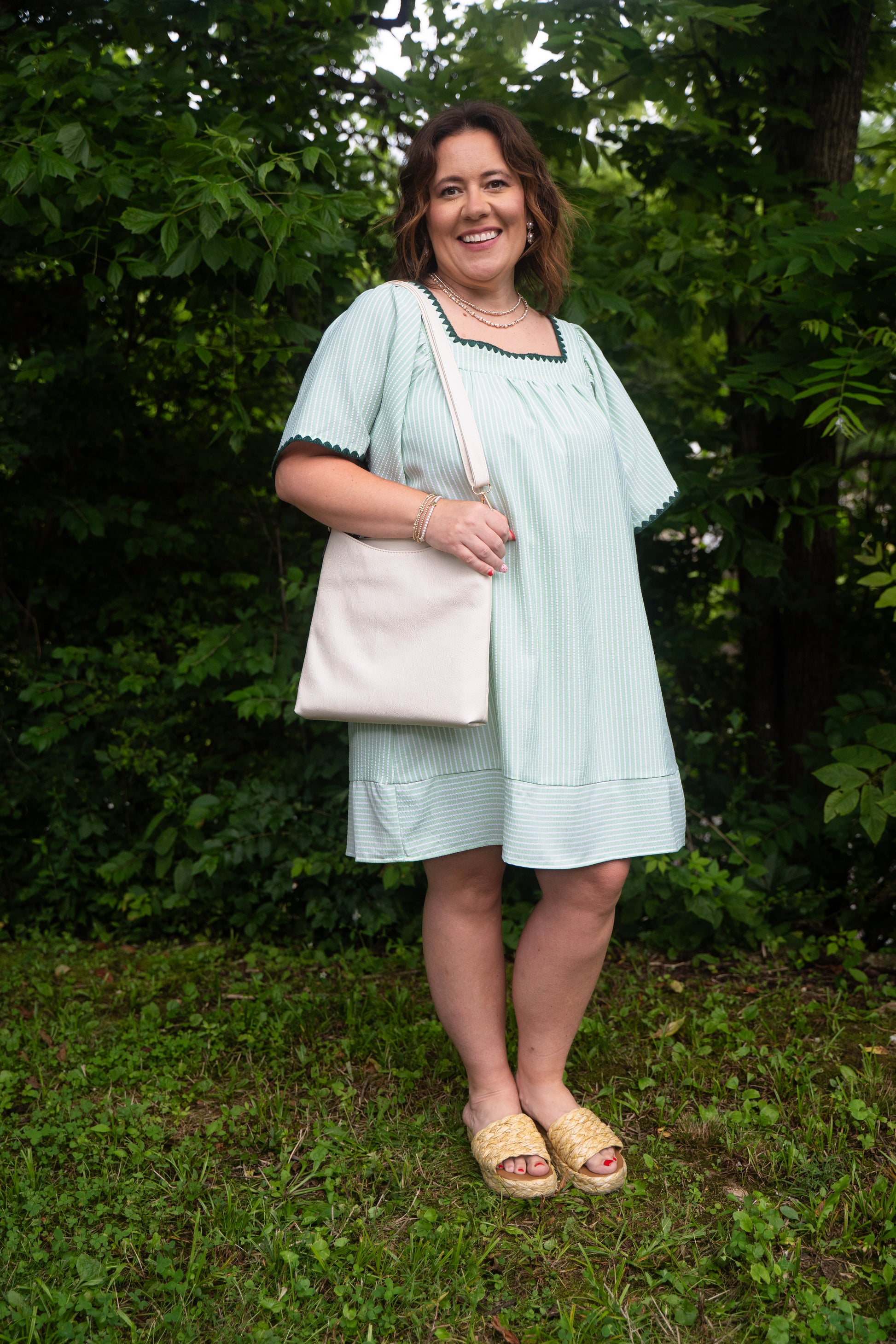 short modest dress with vertical stripes and stitched outline 