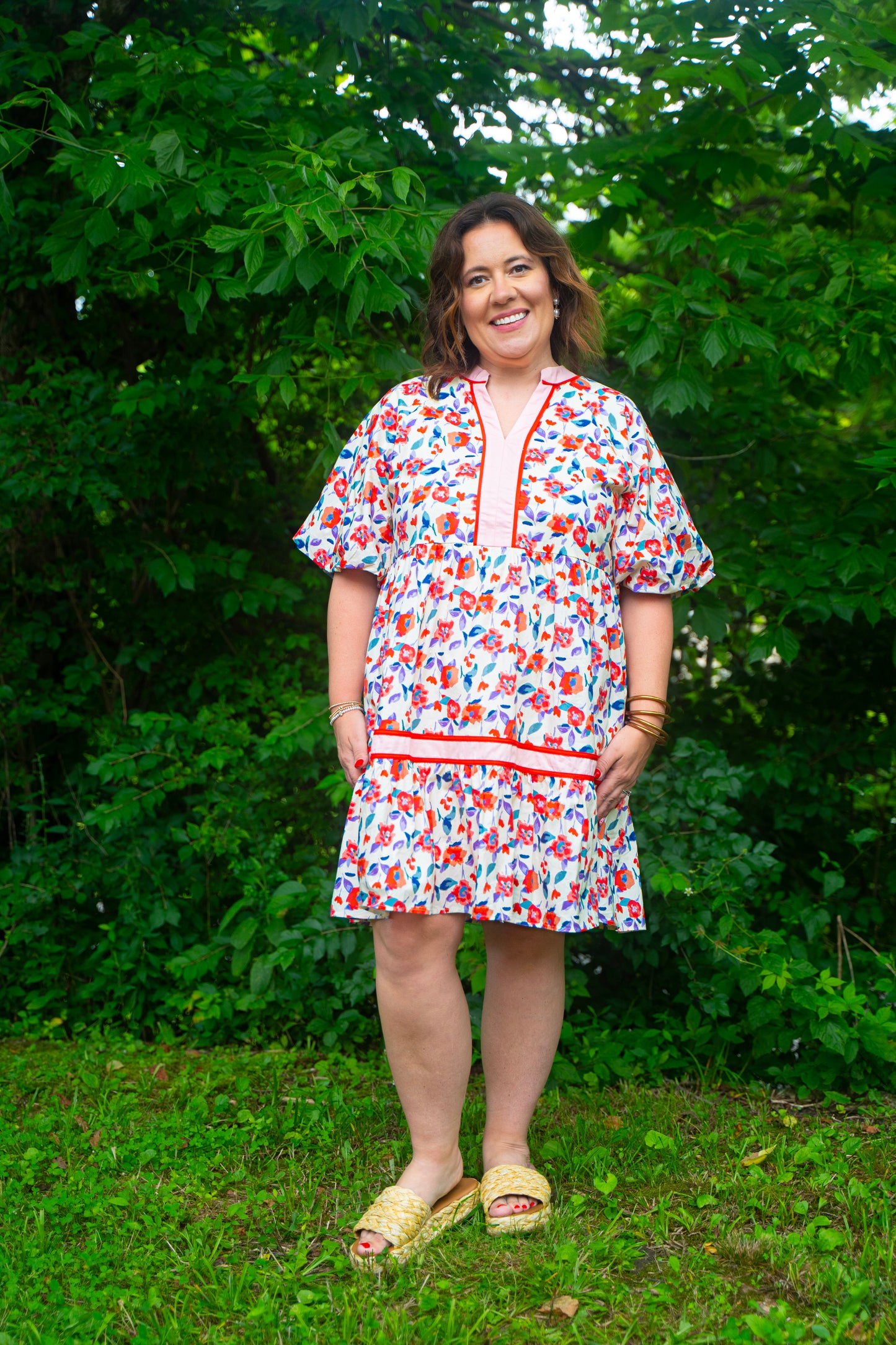 short multi colored floral dress with puff sleeves