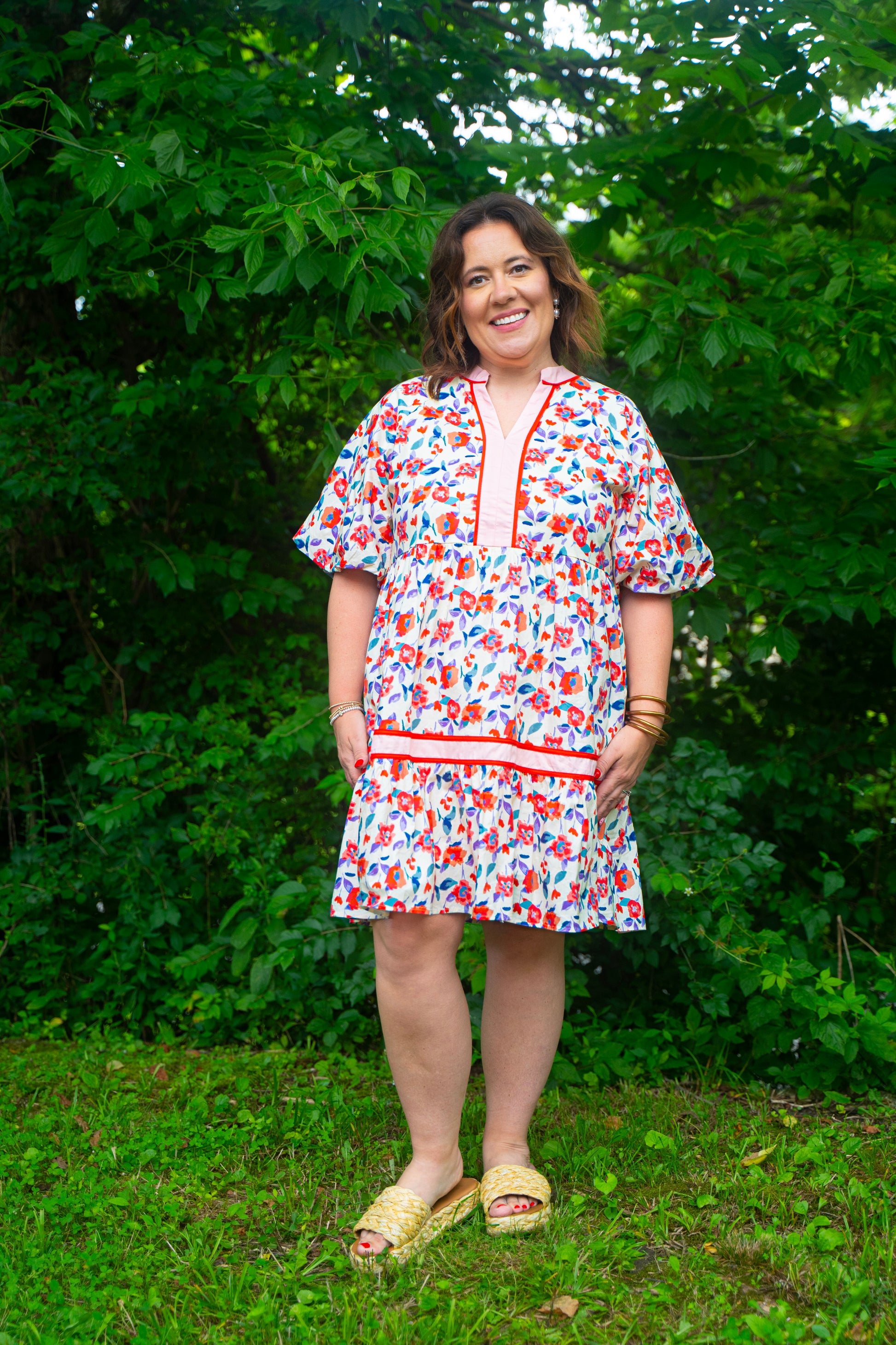 short multi colored floral dress with puff sleeves